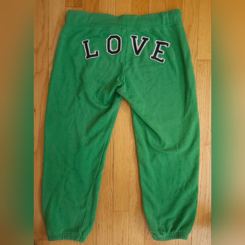 Joggers in Green with a Drawstring and "LOVE" Embroidered on the Back